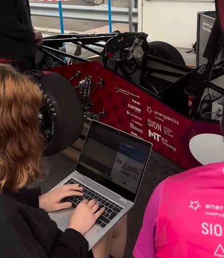 A day with the VRT — telemetry laptop running trackside next to the car during a test session.